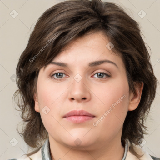 Neutral white young-adult female with medium  brown hair and grey eyes