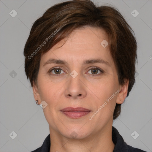 Joyful white adult female with medium  brown hair and grey eyes