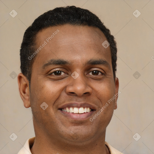 Joyful latino young-adult male with short  brown hair and brown eyes