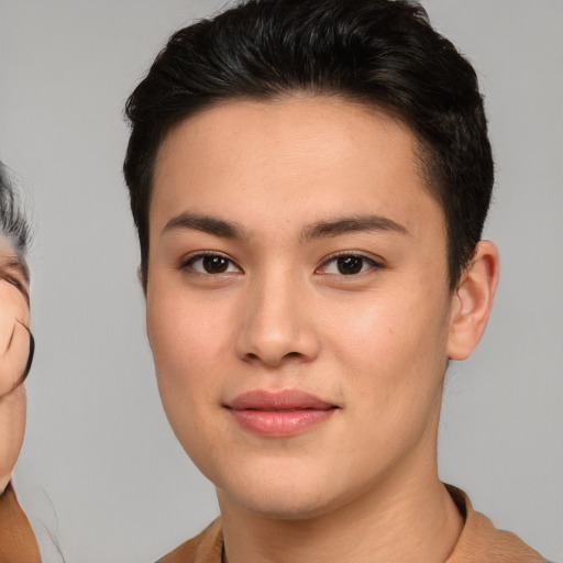 Joyful asian young-adult female with short  brown hair and brown eyes