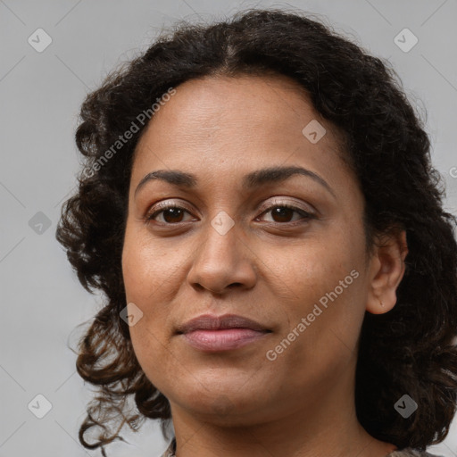 Joyful black young-adult female with medium  brown hair and brown eyes