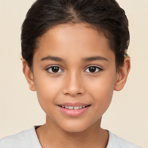 Joyful white child female with short  brown hair and brown eyes