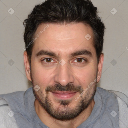 Joyful white adult male with short  black hair and brown eyes