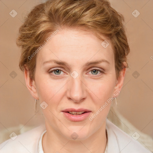 Joyful white adult female with medium  brown hair and blue eyes