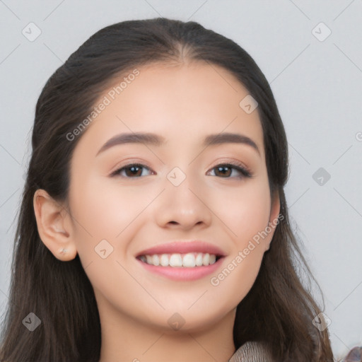 Joyful white young-adult female with long  black hair and brown eyes