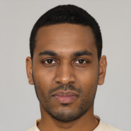 Neutral black young-adult male with short  black hair and brown eyes