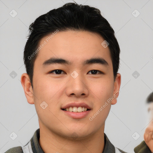 Joyful white young-adult male with short  black hair and brown eyes