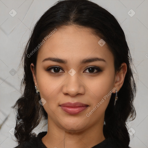 Joyful latino young-adult female with medium  brown hair and brown eyes