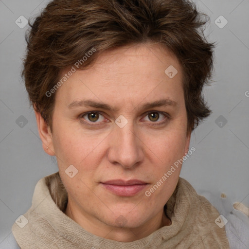 Joyful white adult female with short  brown hair and grey eyes