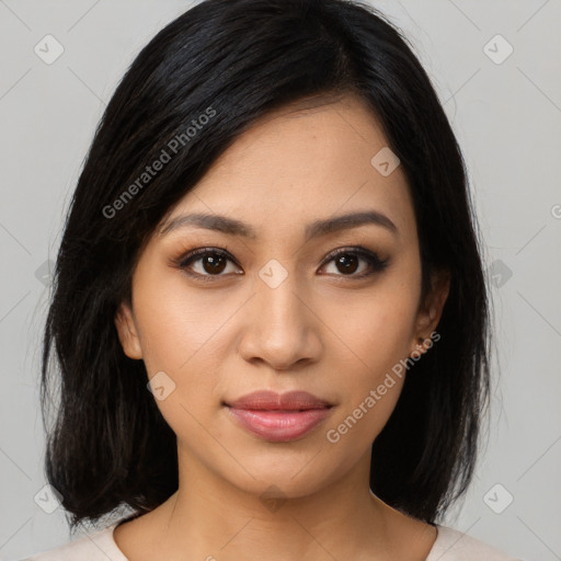 Joyful latino young-adult female with medium  black hair and brown eyes