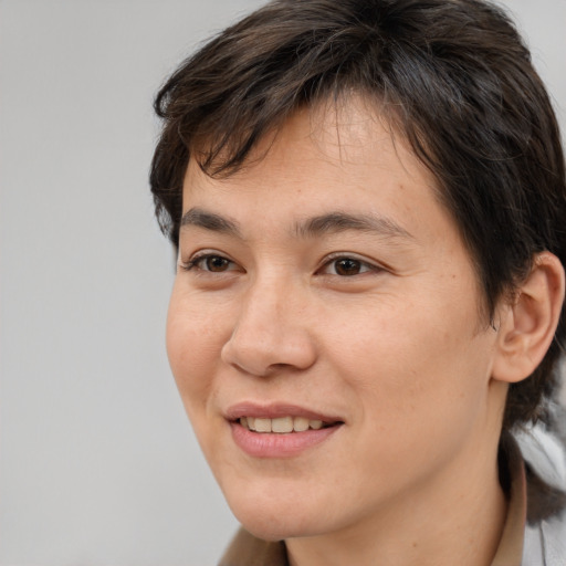 Joyful white young-adult female with medium  brown hair and brown eyes