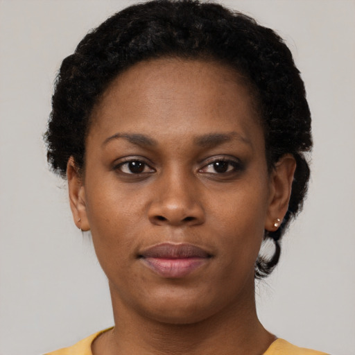 Neutral black young-adult female with short  black hair and brown eyes