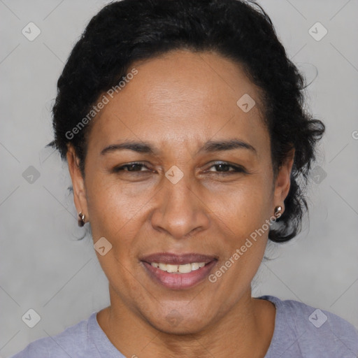 Joyful latino adult female with short  brown hair and brown eyes