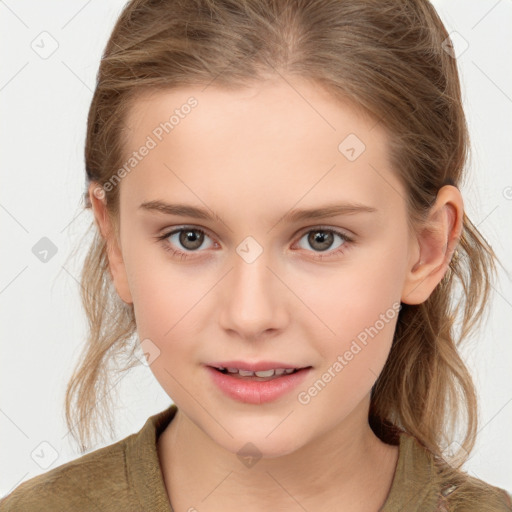 Joyful white child female with medium  brown hair and grey eyes