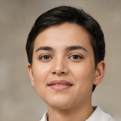 Joyful latino young-adult female with short  brown hair and brown eyes