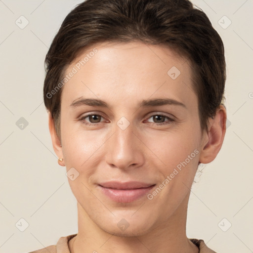 Joyful white young-adult female with short  brown hair and brown eyes