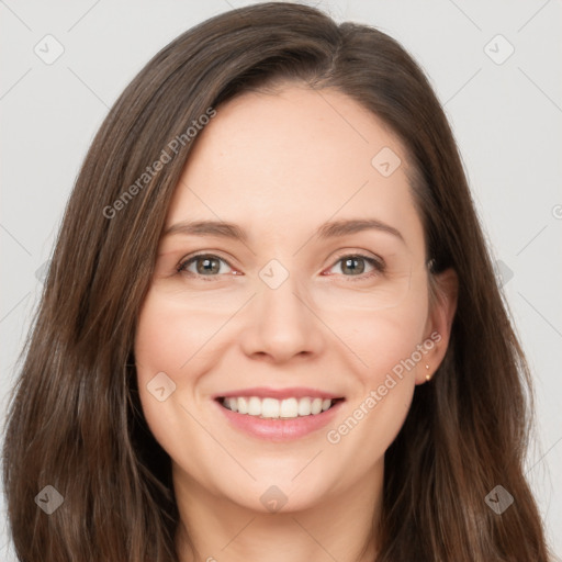 Joyful white young-adult female with long  brown hair and grey eyes