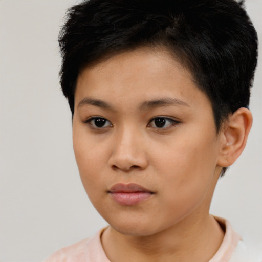 Neutral latino young-adult female with short  brown hair and brown eyes