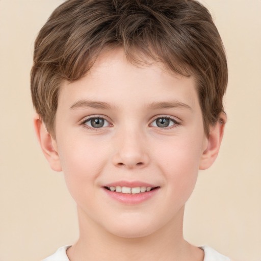 Joyful white child male with short  brown hair and brown eyes