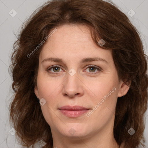 Joyful white young-adult female with medium  brown hair and green eyes