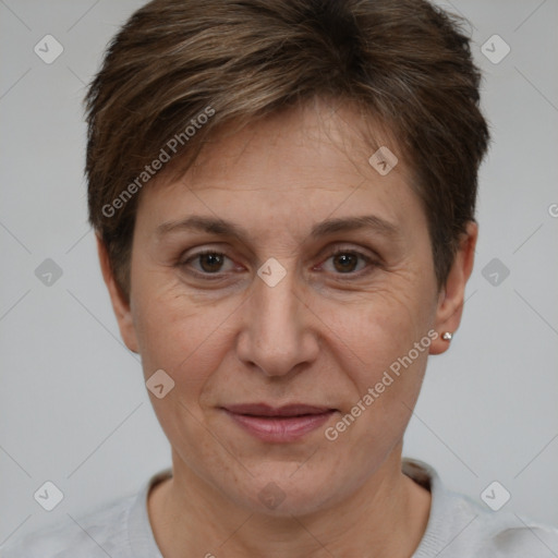 Joyful white adult female with short  brown hair and brown eyes