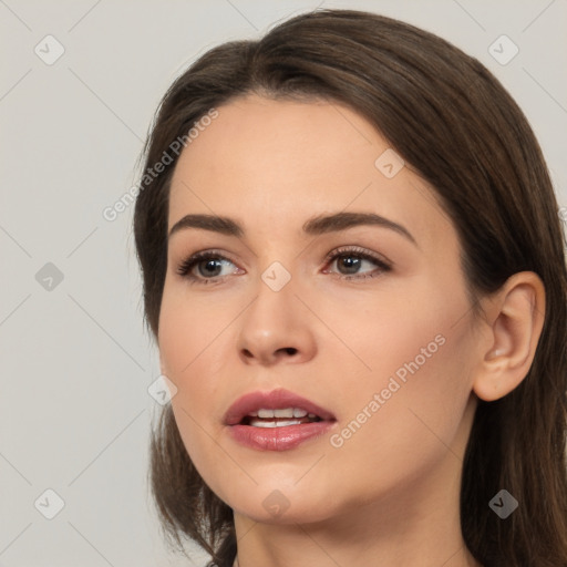 Neutral white young-adult female with medium  brown hair and brown eyes