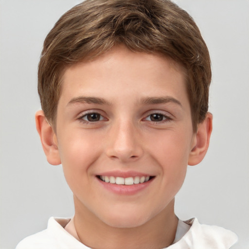 Joyful white child male with short  brown hair and brown eyes