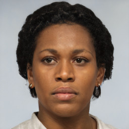 Neutral black young-adult female with short  black hair and brown eyes