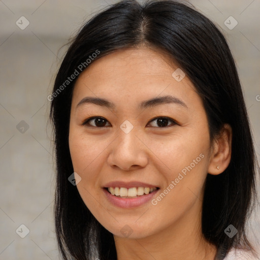 Joyful latino young-adult female with long  brown hair and brown eyes