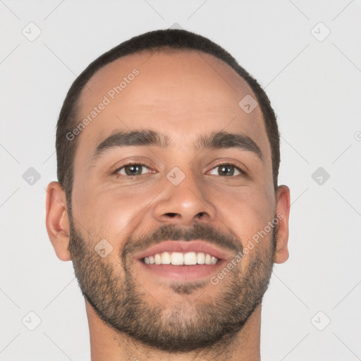 Joyful white young-adult male with short  black hair and brown eyes