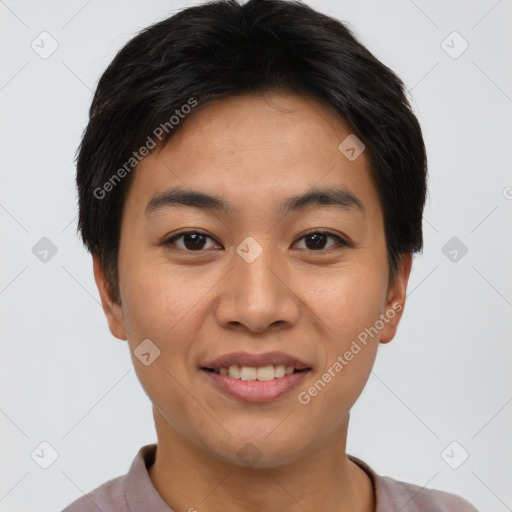 Joyful asian young-adult female with short  brown hair and brown eyes