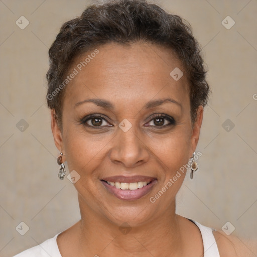 Joyful white adult female with short  brown hair and brown eyes