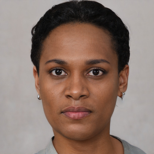 Neutral black young-adult female with short  black hair and brown eyes