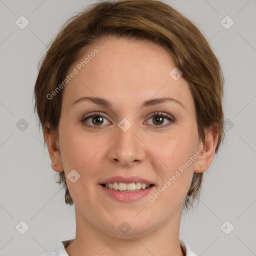 Joyful white young-adult female with medium  brown hair and grey eyes