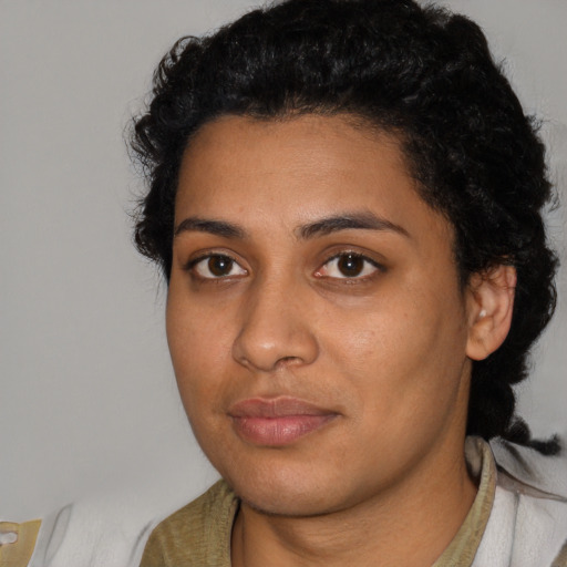 Neutral latino young-adult female with short  black hair and brown eyes