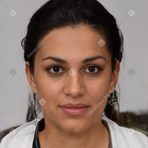 Joyful latino young-adult female with short  brown hair and brown eyes