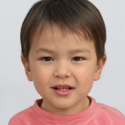 Joyful white child male with short  brown hair and brown eyes