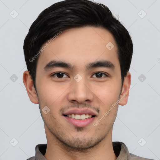 Joyful asian young-adult male with short  black hair and brown eyes