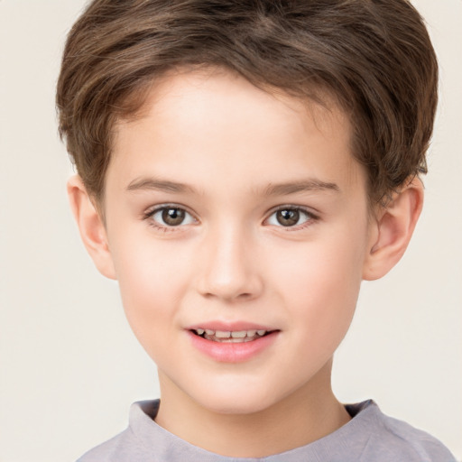 Joyful white child male with short  brown hair and brown eyes