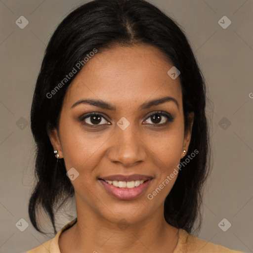 Joyful black young-adult female with medium  brown hair and brown eyes