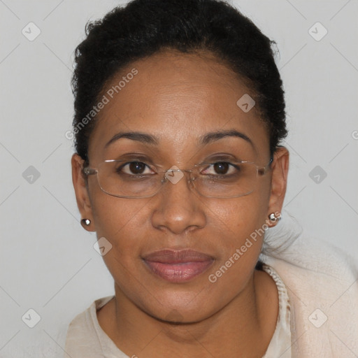 Joyful black adult female with short  brown hair and brown eyes