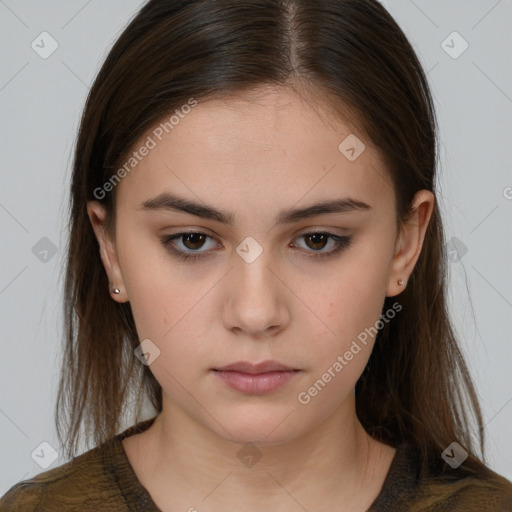 Neutral white young-adult female with long  brown hair and brown eyes