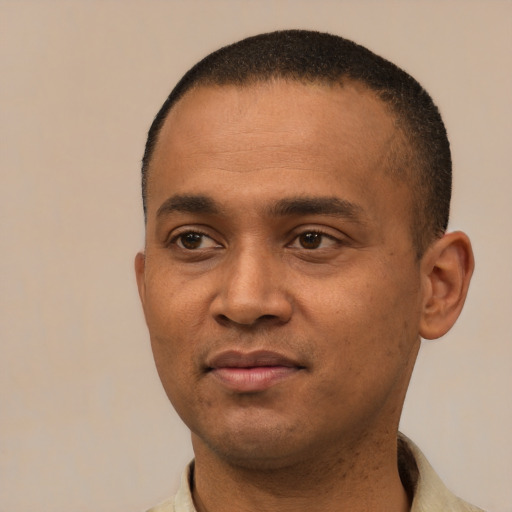 Neutral black young-adult male with short  black hair and brown eyes