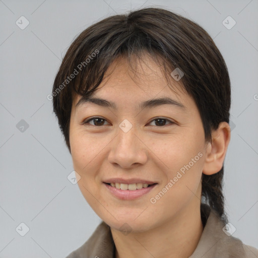 Joyful asian young-adult female with medium  brown hair and brown eyes