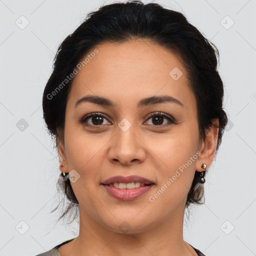 Joyful latino young-adult female with medium  brown hair and brown eyes