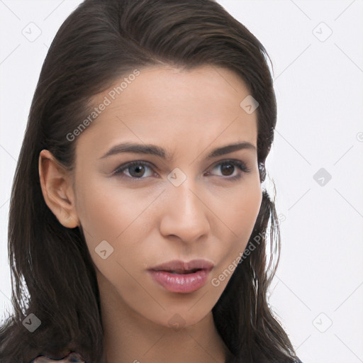 Neutral white young-adult female with long  brown hair and brown eyes