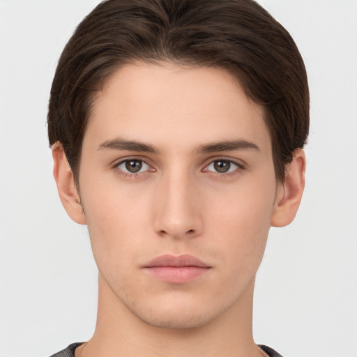 Neutral white young-adult male with short  brown hair and brown eyes