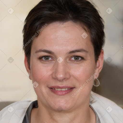 Joyful white adult female with short  brown hair and brown eyes