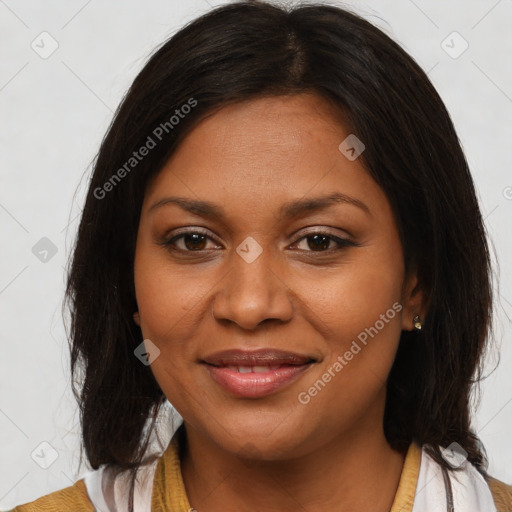 Joyful black young-adult female with medium  brown hair and brown eyes