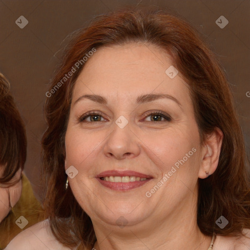 Joyful white adult female with medium  brown hair and brown eyes